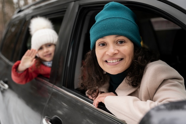 Family having fun during winter roadtrip