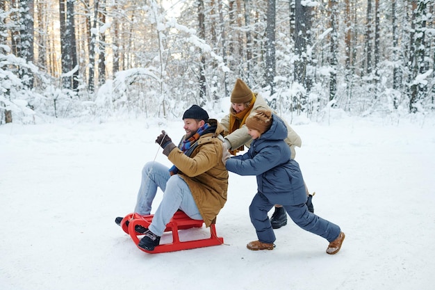 Family having fun during winter vacation