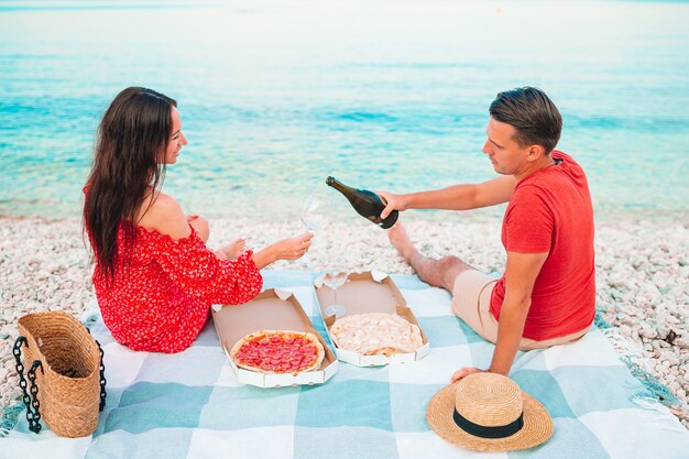 Family having a picnic on the beach