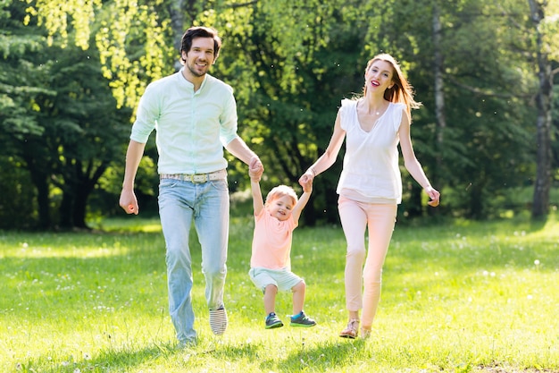 Family having walk together in summer