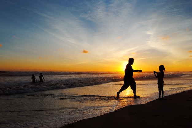 Family Holiday at Beach during sunset