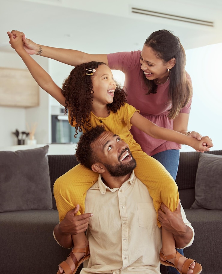Photo family home pretend airplane and kid with mom dad and young girl together with fun living room mother and father with a child by sofa with love bonding and parent support with a smile in lounge