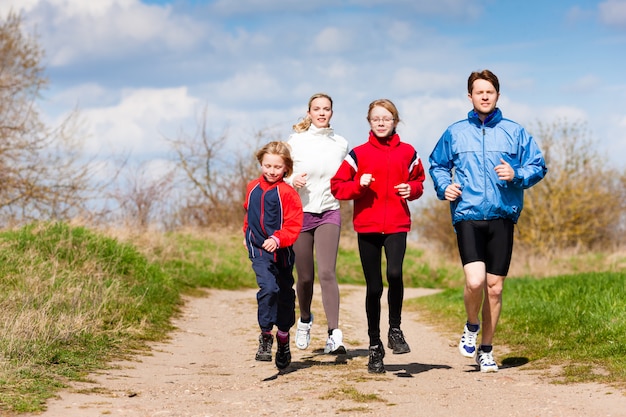 Family is running outdoors