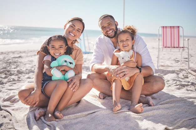 Family kids sitting on sand on beach holiday vacation and trip smile happy and relax Love parents and children with toys close to seaside on the weekend for fun enjoyment and a break in summer