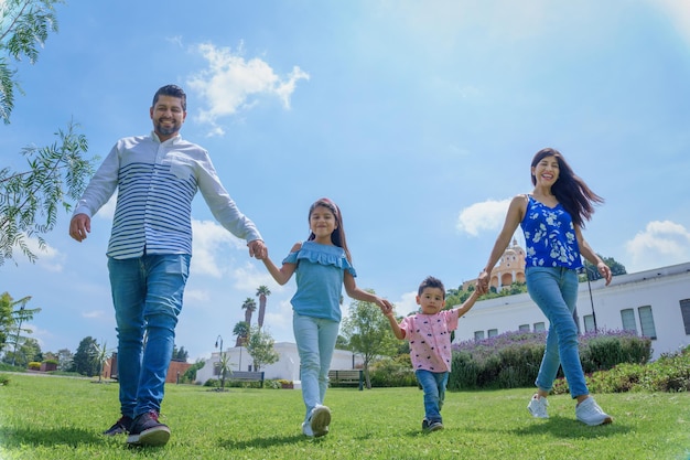 Family, leisure and people concept - happy mother, father and son