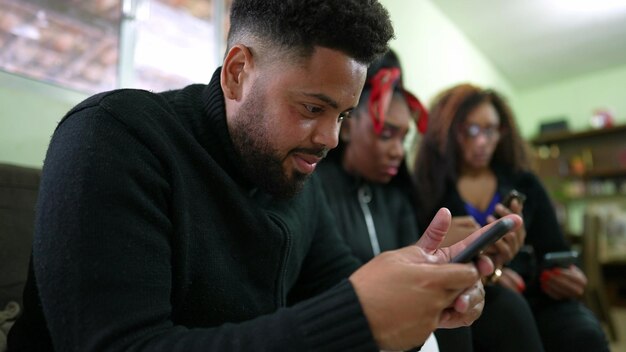 Family looking at cellphone devices each in their own bubble