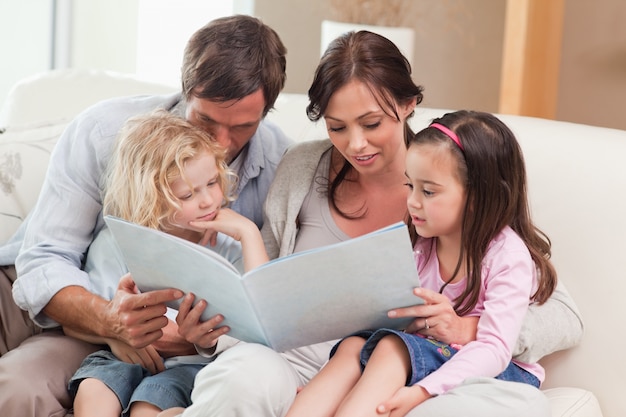 Family looking at a photo album