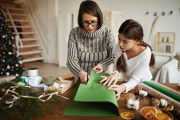 Family making Christmas present