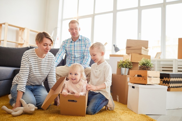 Family in messy living room