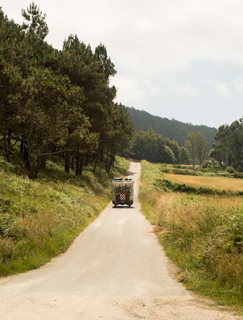 family in motorhome traveling nature