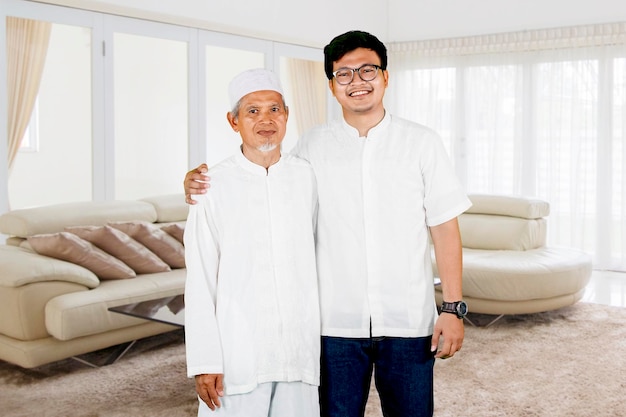 Family photo of father and son during Eid Mubarak celebration