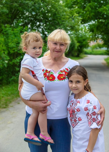 Family photo of a Ukrainian woman in embroidered shirts Selective focus