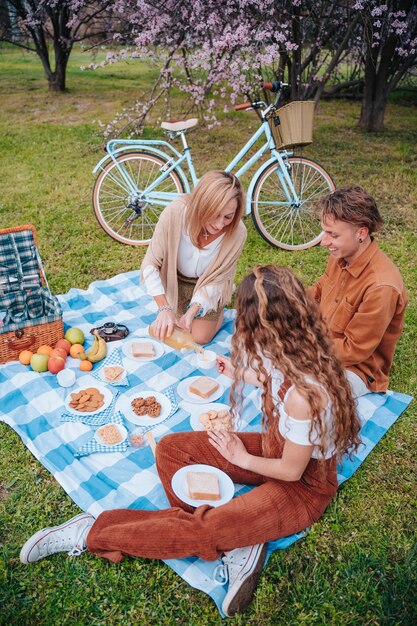 Family picnic celebrating Mothers Day with their son and daughter