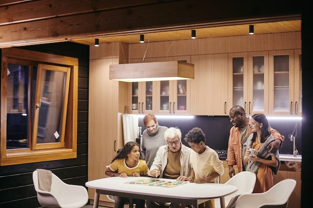 Family playing board game at home