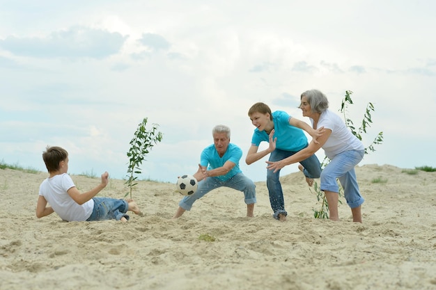 Family playing football