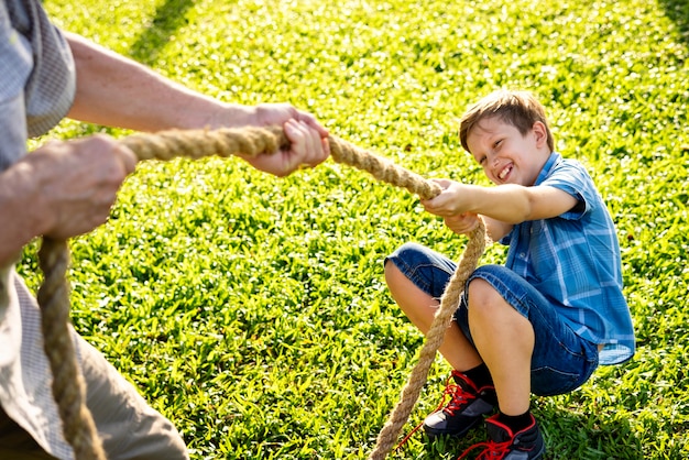 Family playing tug of war