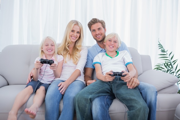 Family playing video games together