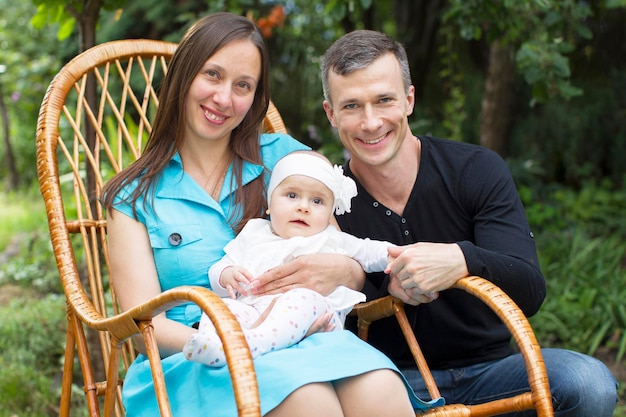 Family portrait mom dad and little baby Parents with baby