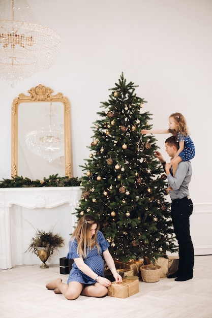 Family posing on christmas day