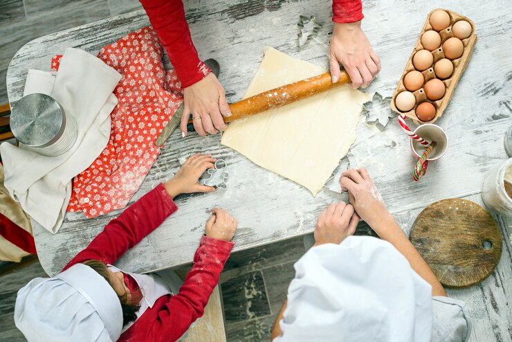 Photo family prepare xmas cookies