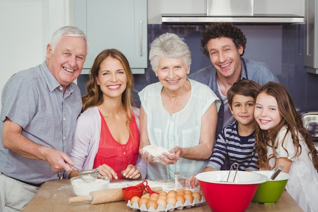 Family preparing food in the kitchen