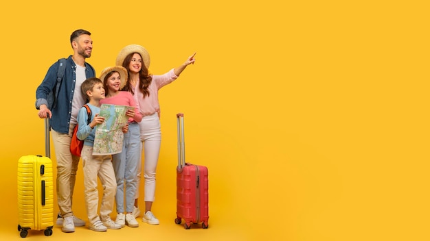 Family ready for vacation with luggage and map