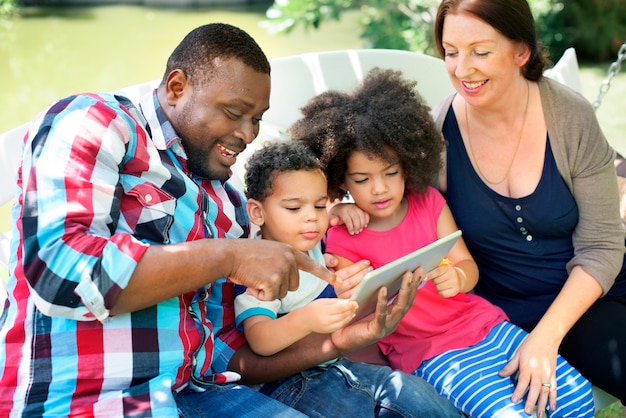 Family Relax Happiness Using Tablet Concept