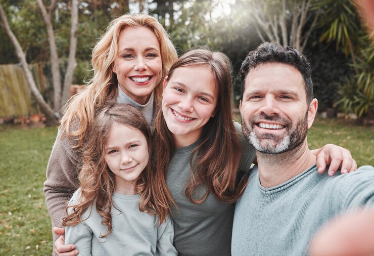 Photo family selfie smile and outdoor in park with happiness love and bonding on social media app or internet post father mother and daughter on grass for profile picture backyard garden and web blog
