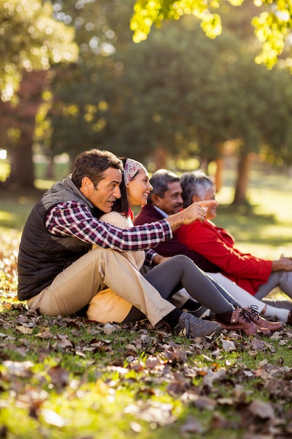 Family sitting at park