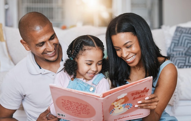 Family smile and girl reading book in home bonding and learning in living room with parents Storytelling father and happiness of mother with kid for education homeschool and studying together