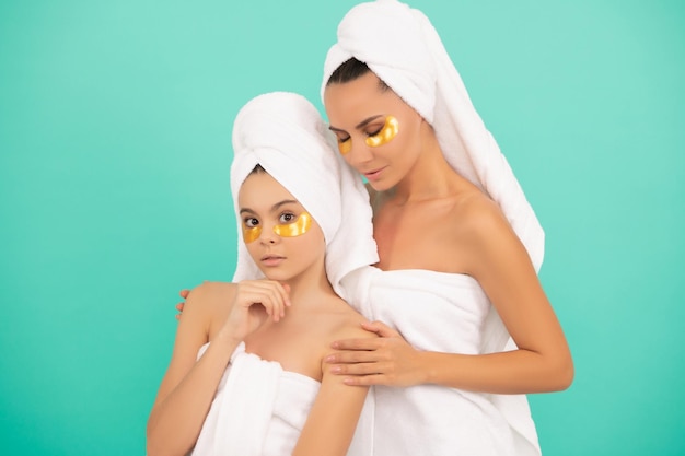 Family spa of mother and daughter with moisturizing patch