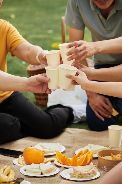 Family Toasting with Disposable Cups