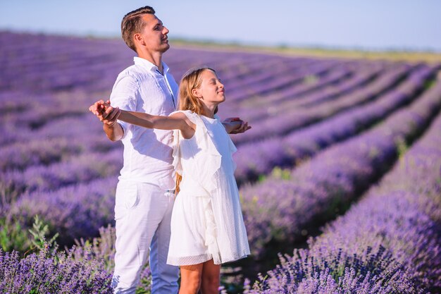 Family of two in lavender flowers field