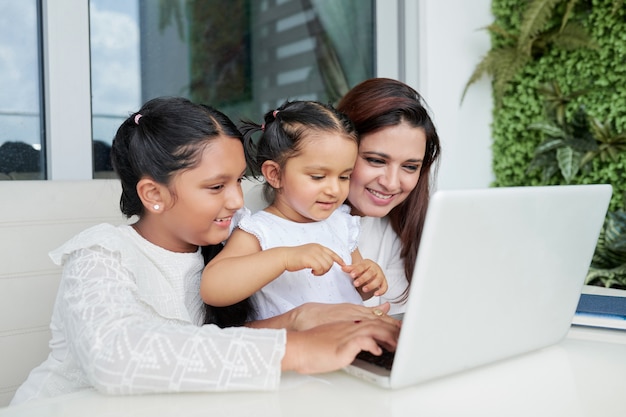 Family using laptop