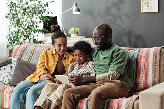 Family using tablet pc at home