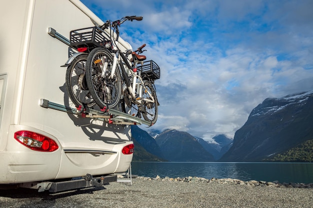 Family vacation travel RV, holiday trip in motorhome, Caravan car Vacation. Beautiful Nature Norway natural landscape.