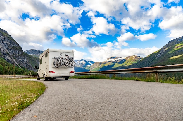 Photo family vacation travel rv, holiday trip in motorhome, caravan car vacation. beautiful nature norway natural landscape.