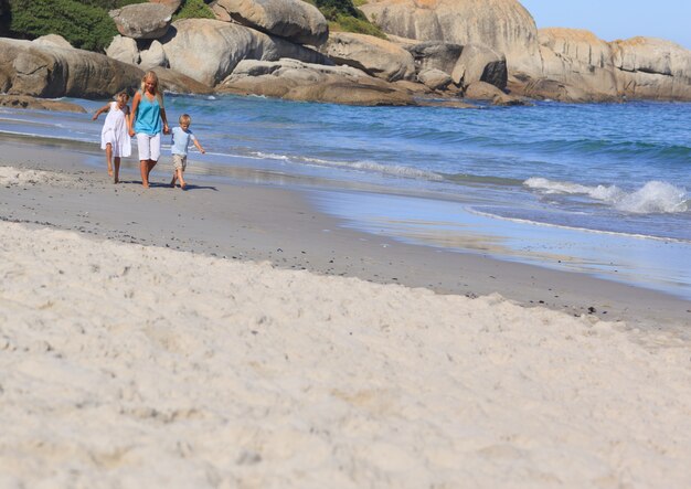 Family walking on the beach