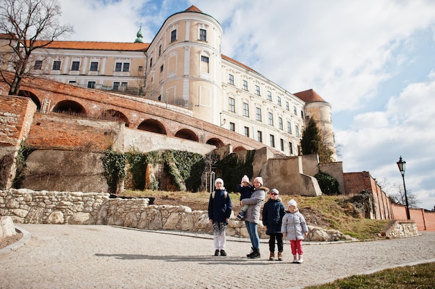 Family walking at historical Mikulov Castle Moravia Czech Republic Old European town
