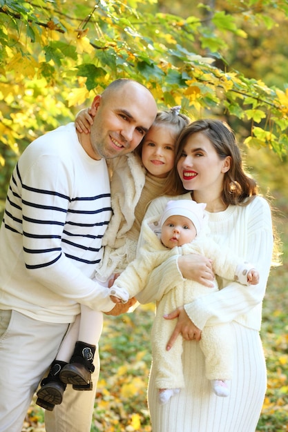 Family walking together in the forest during day