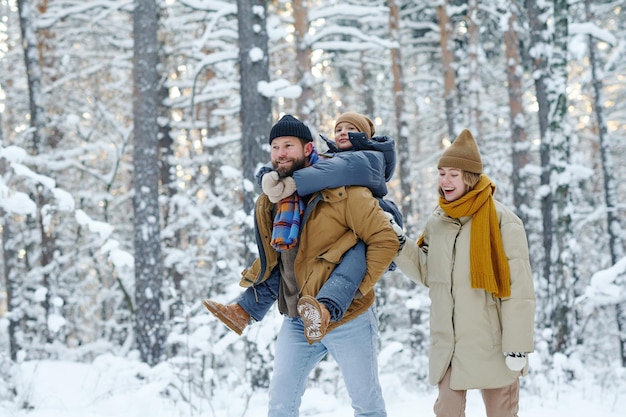 Family walking with child outdoors