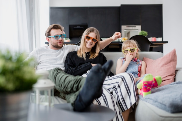 Family watching film together