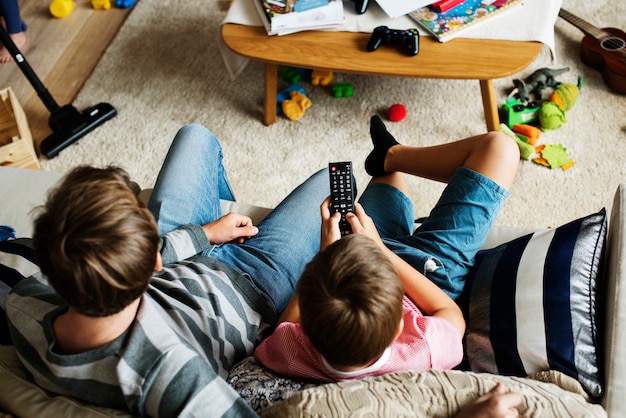 Family watching TV together