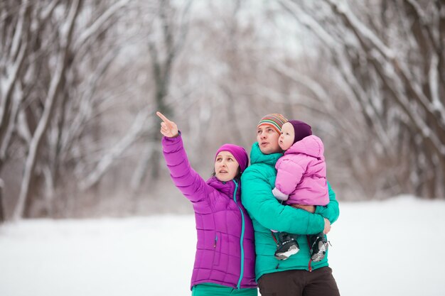 Family in the winter forest