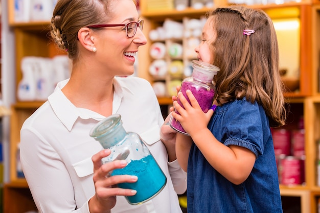 Family with pigment colors in store