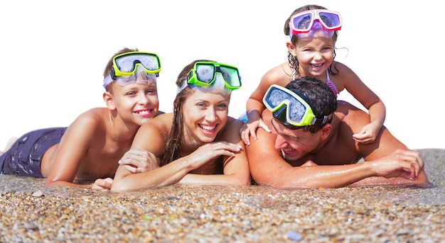 Family With Snorkels Enjoying Beach Holiday