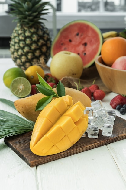 Famous Alphonso mango slices over wood background,Selective focus image.