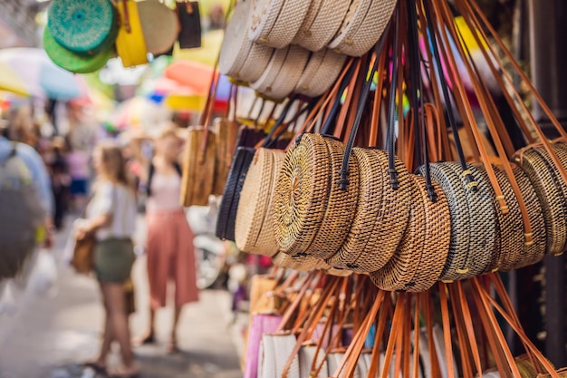 Famous Balinese rattan eco bags in a local souvenir market in Bali, Indonesia