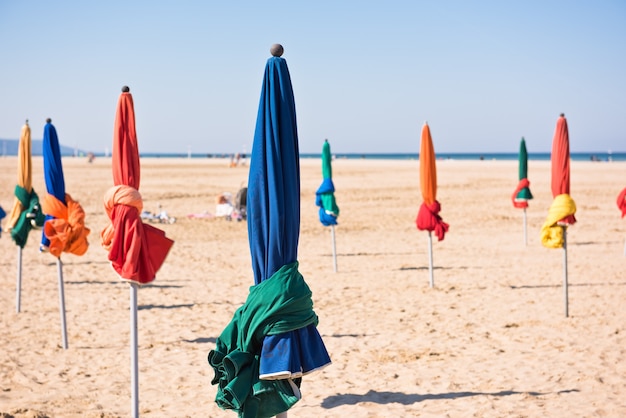 The famous colorful parasols on Deauville beach, Normandy, Northern France