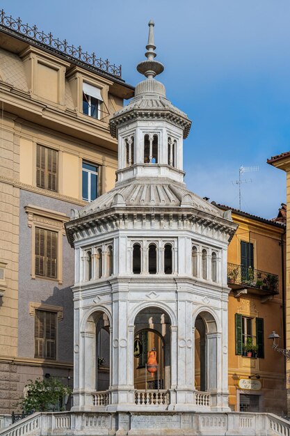 Famous fountain built in 1879 on the termal spring called La Bollente in the old town of Acqui Terme, Piedmont, Italy